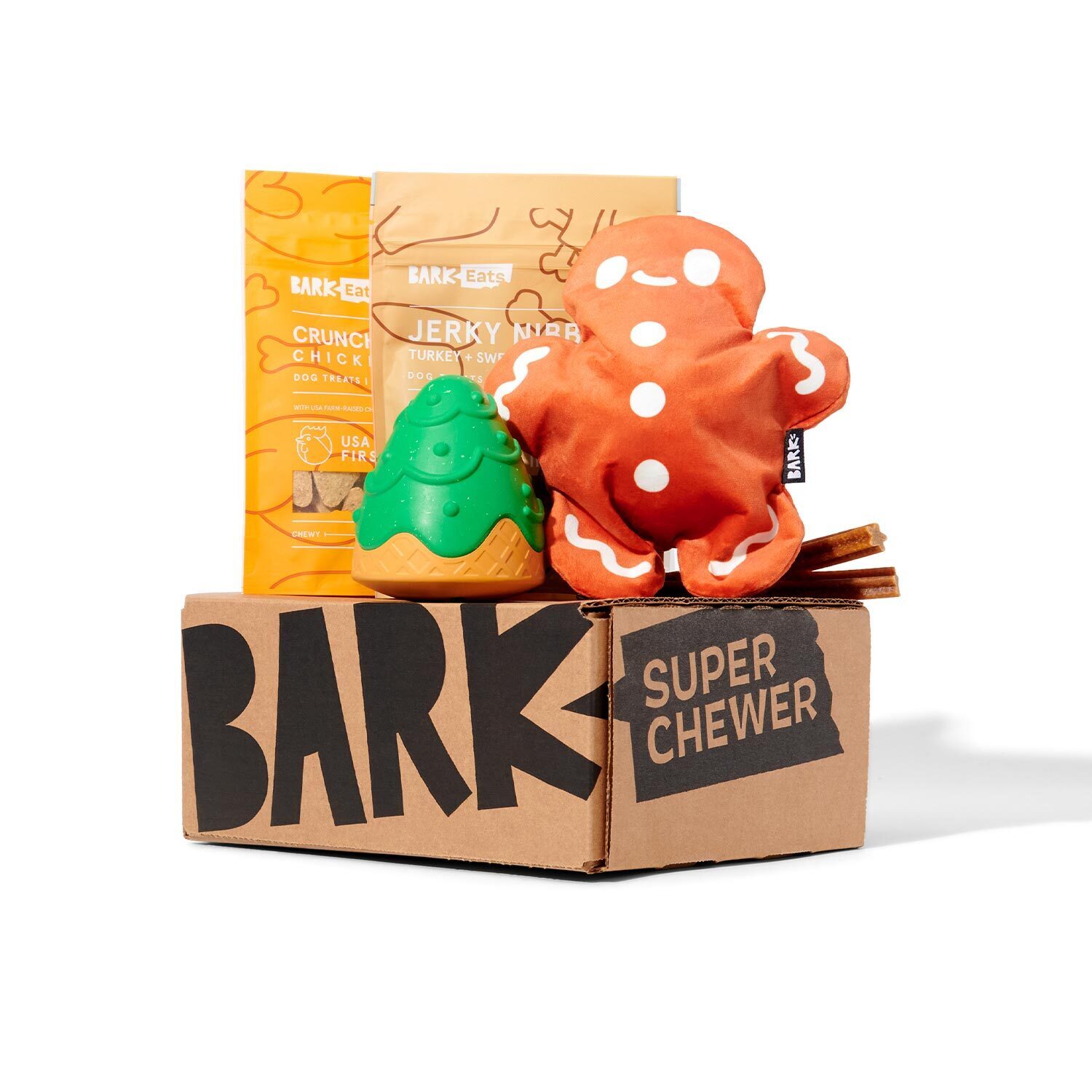 Super Chewer box full of holiday-themed toys, treats, and chews