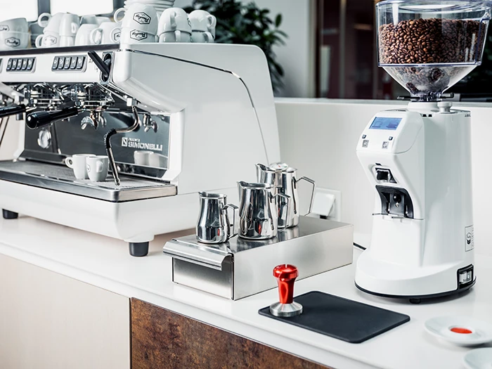 Tradistional espresso machine with barista accessories