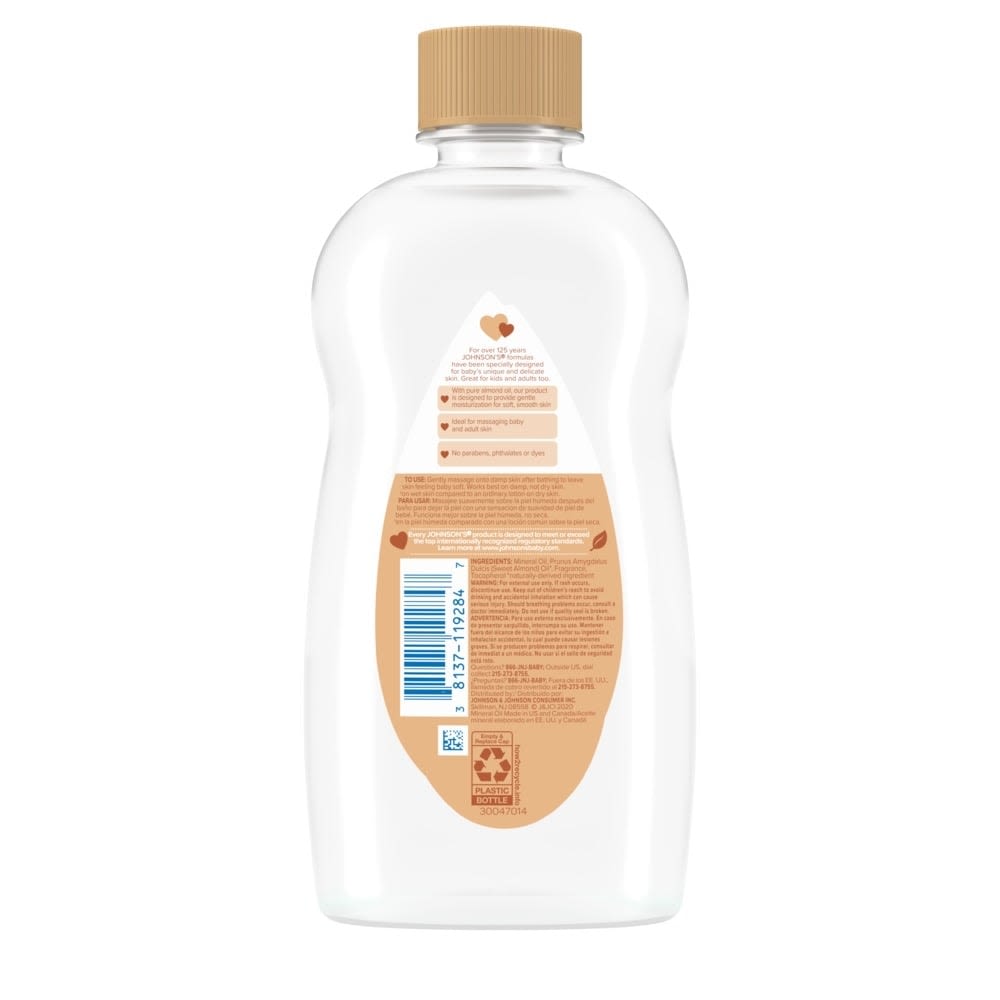 Back view of a bottle of moisturizing almond oil for dry skin, with a beige cap and detailed product information on the label.