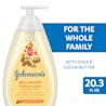 Johnson's Skin Nourish moisture wash bottle, 20.3 fl oz, with text 'For the whole family' and 'With shea & cocoa butter'.