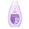 Back view of Johnson's Kids Strengthening Conditioner with Vitamin E with purple packaging, showing ingredients list and product details.