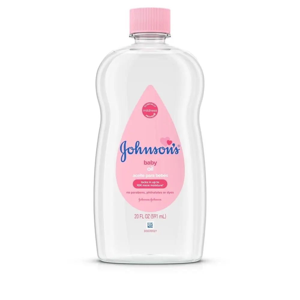Johnson's Baby Oil bottle with pink cap, 20 FL OZ (591 mL), labeled as mildness tested, locks in up to 10 times more moisture, and free of parabens, phthalates, or dyes.