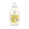 A semi-transparent bottle with a pump dispenser contains liquid. It is labeled “Johnson's CottonTouch Newborn Wash & Shampoo” with product details in English and Spanish on the back against a white background.