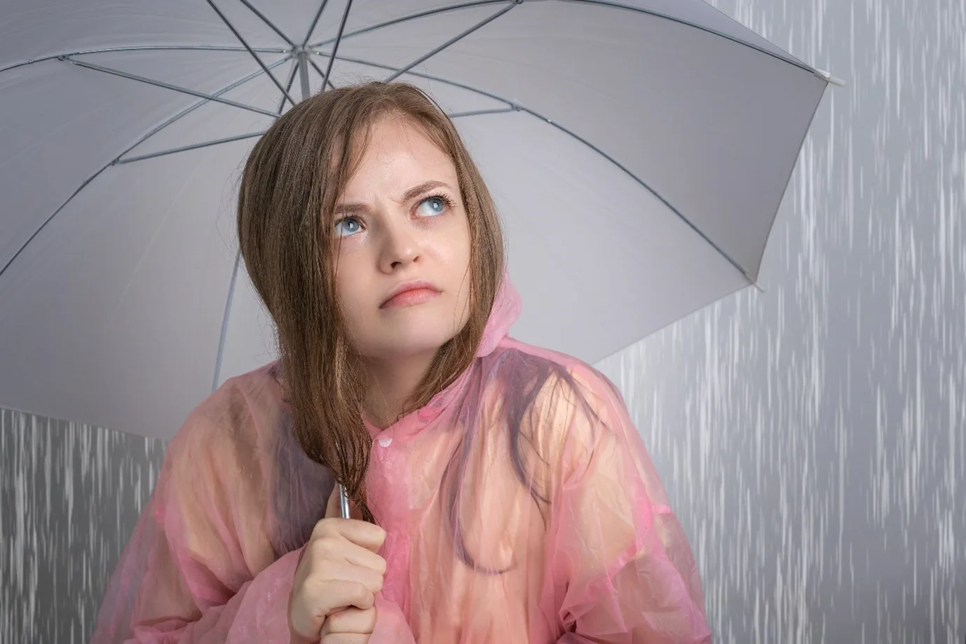 Woman standing in rain