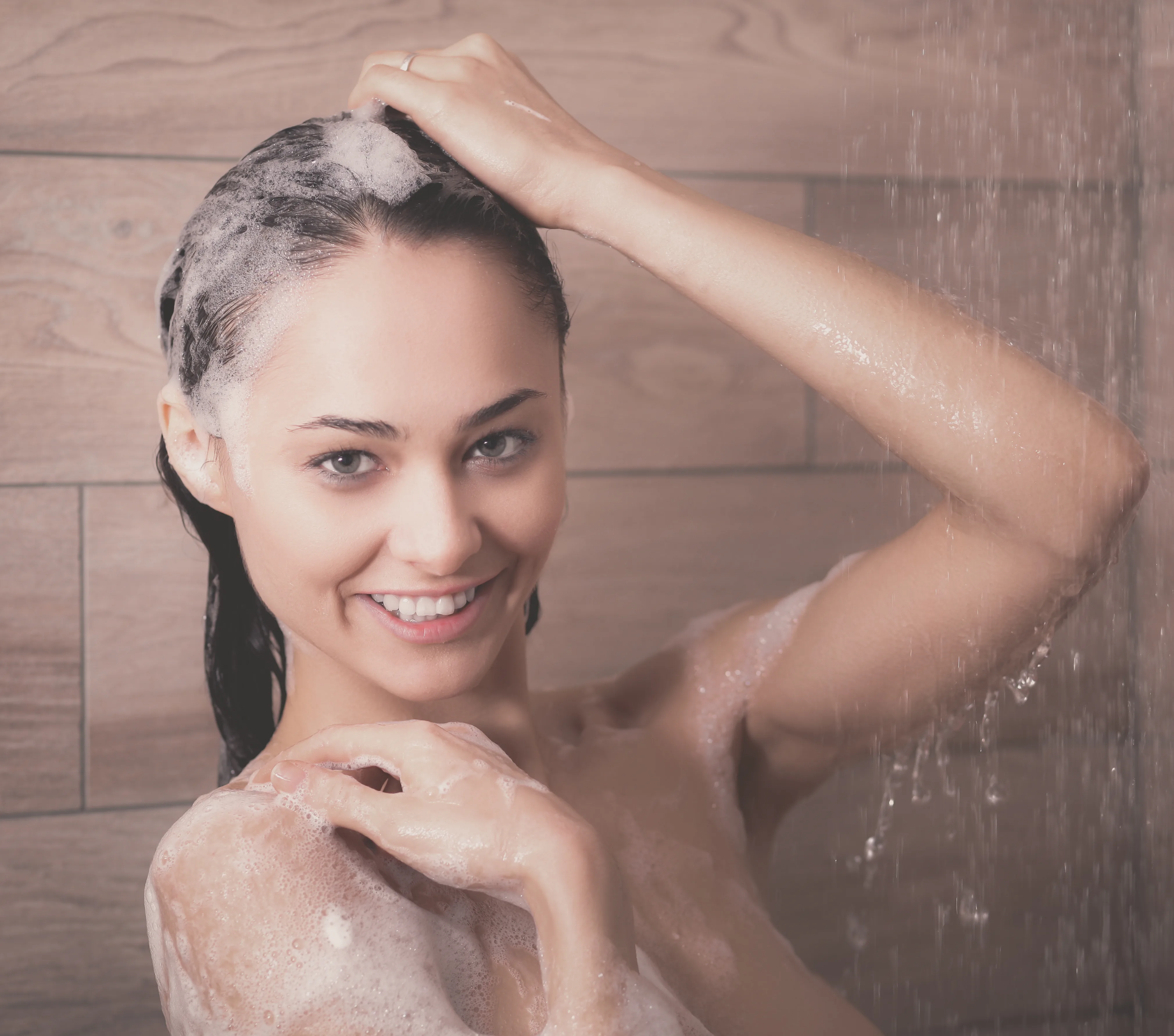 Woman Applying H&S Anti-dandruff Shampoo