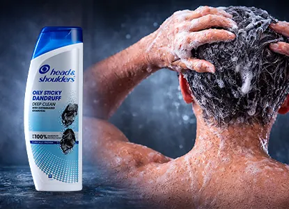 Head & Shoulders Deep Cleanse Charcoal Shampoo at the center, surrounded by person washing their hair to highlight benefits.