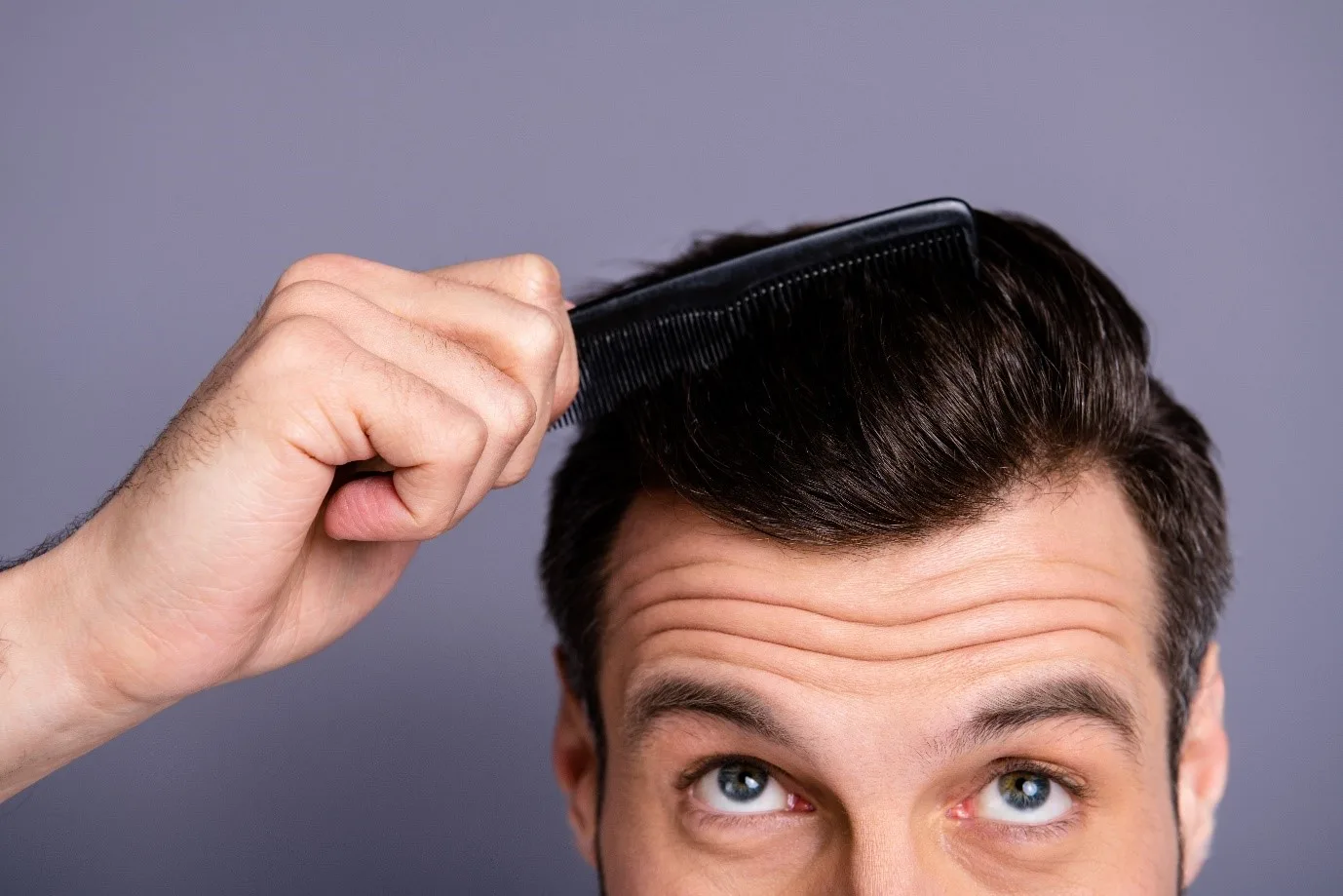 Man combing Thick hair