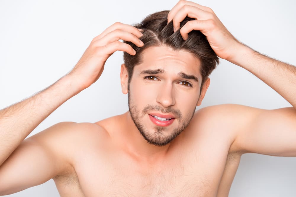 Dandruff In Men: How To Get Rid Of Dandruff Without Pulling Out Your Hair.