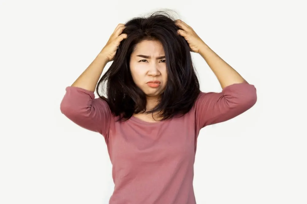 What Are The Symptoms Of Dandruff?
