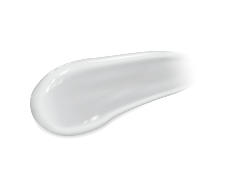 Glossy white gel cream on a white surface showcasing its lightweight texture and sheer color