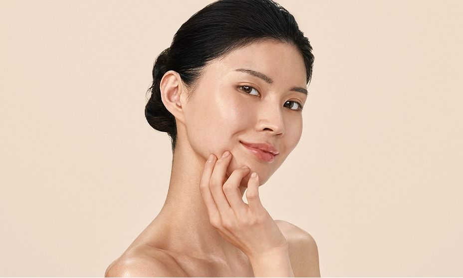 Happy woman with a positively radiant skin