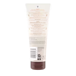 Back Shot of Tube of Aveeno® Tone + Texture Renewing Body Scrub in 227g