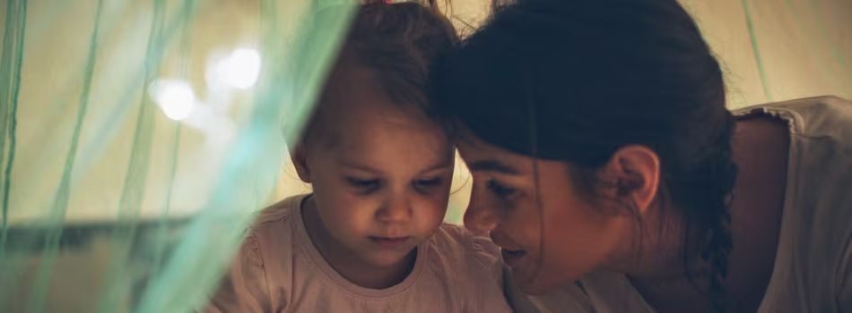 Mother smiling at her child