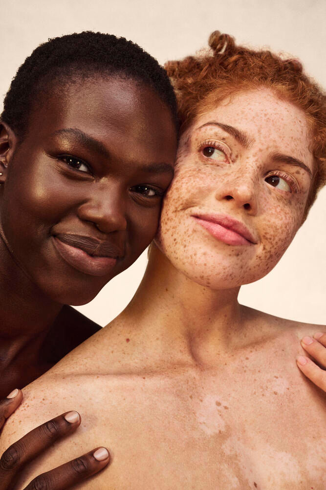 smiling aveeno model looking down banner