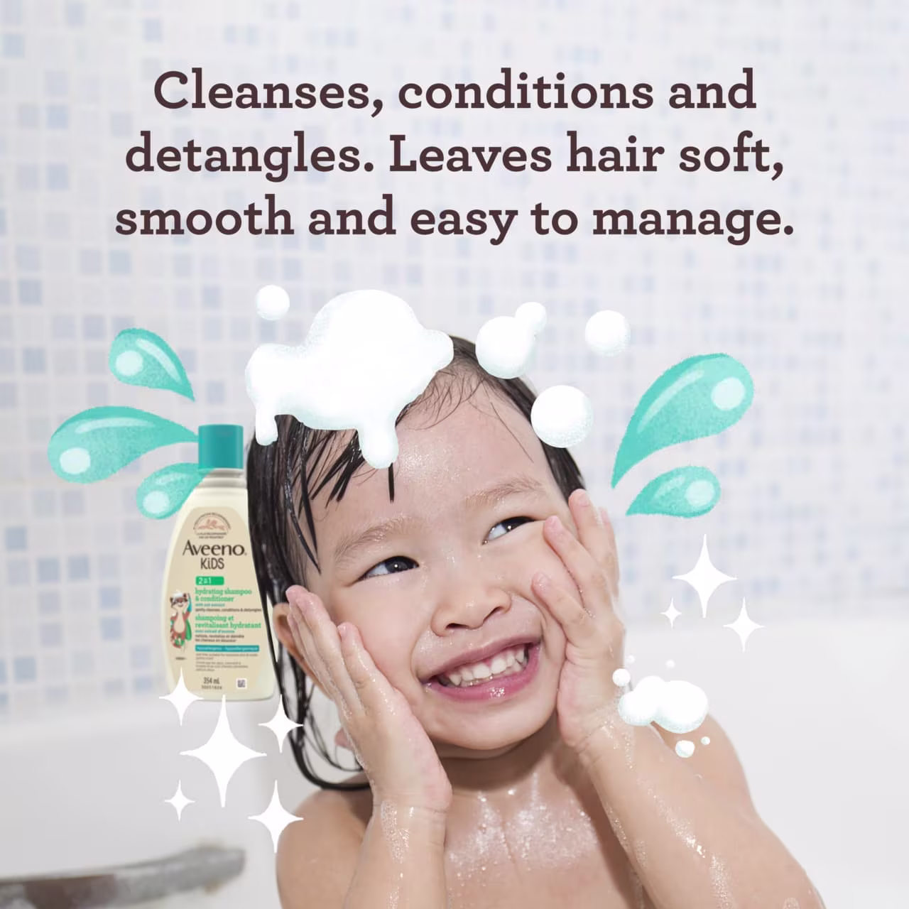 Smiling child in bath using the AVEENO® Kids Hydrating Shampoo & Conditioner