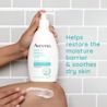 Close up of person holding Calm + Restore Oat Repairing Lotion, applying it on leg with claim "Helps restore the moisture barrier & soothes dry skin"