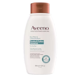 Pack shot of Aveeno® Rosewater & Chamomile Blend Soothe and Soften Shampoo for Dry Hair, 12 fl oz