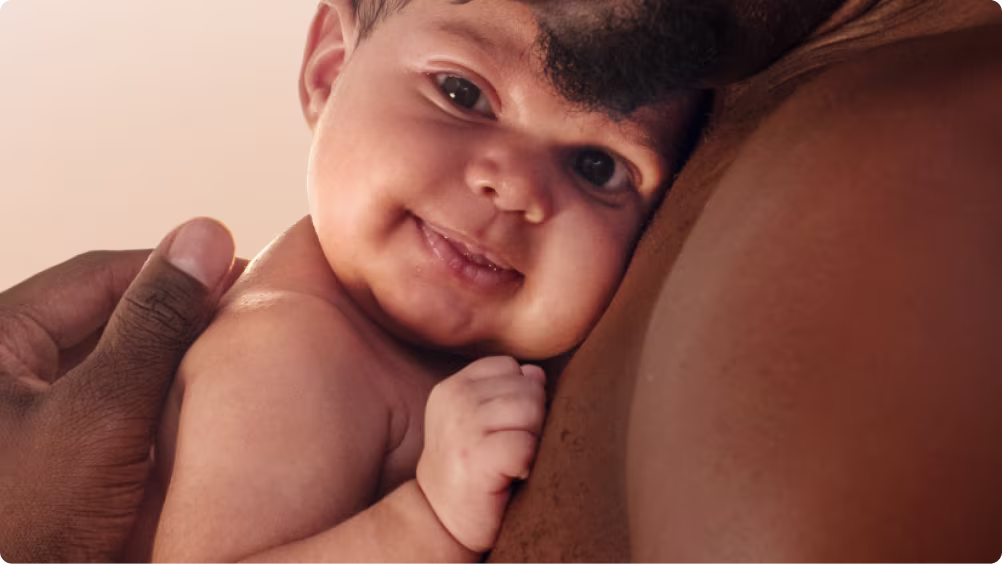 Aveeno® All Baby Products Banner - A father holding his baby in his arms