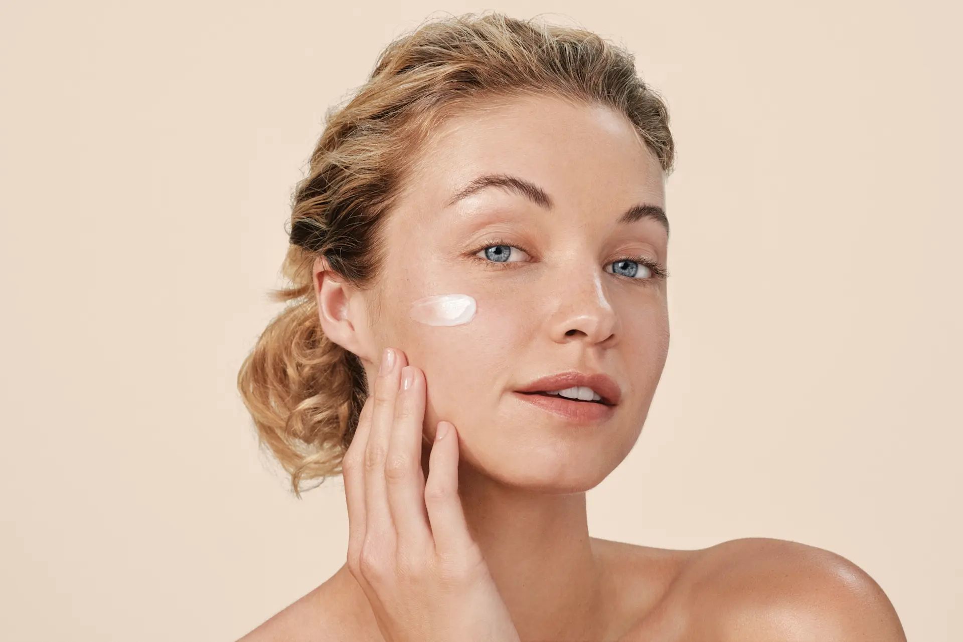 woman-showing-glowing-skin-from-aveeno