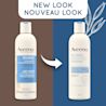 Ancien et nouvel emballage du flacon de 295 ml de l'huile bain et douche apaisante AVEENO®, avec la mention "nouveau look"