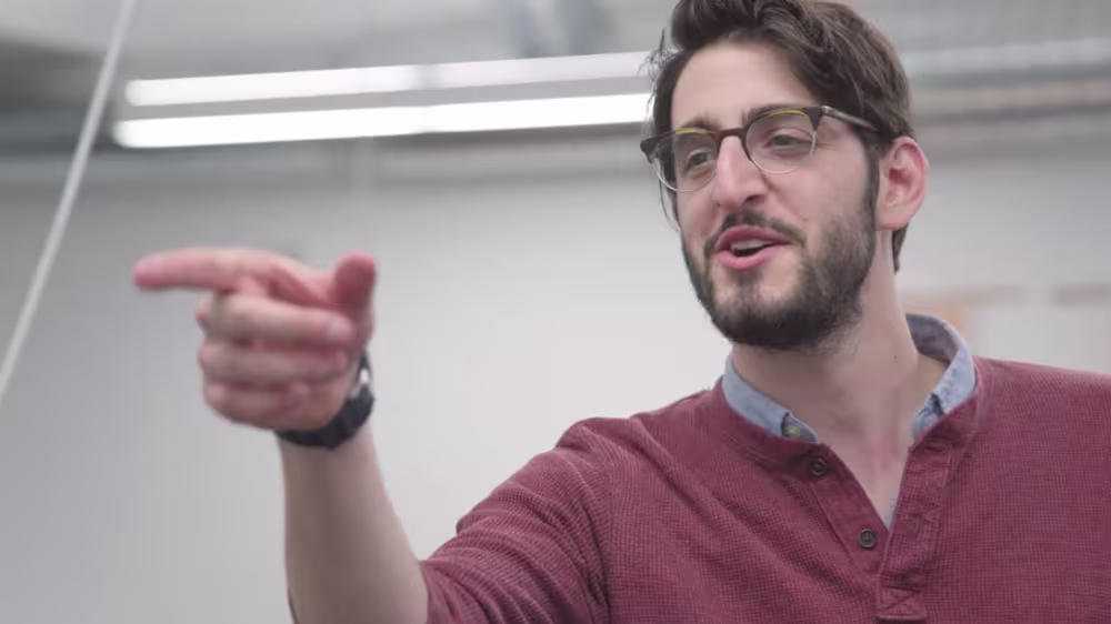 a man pointing