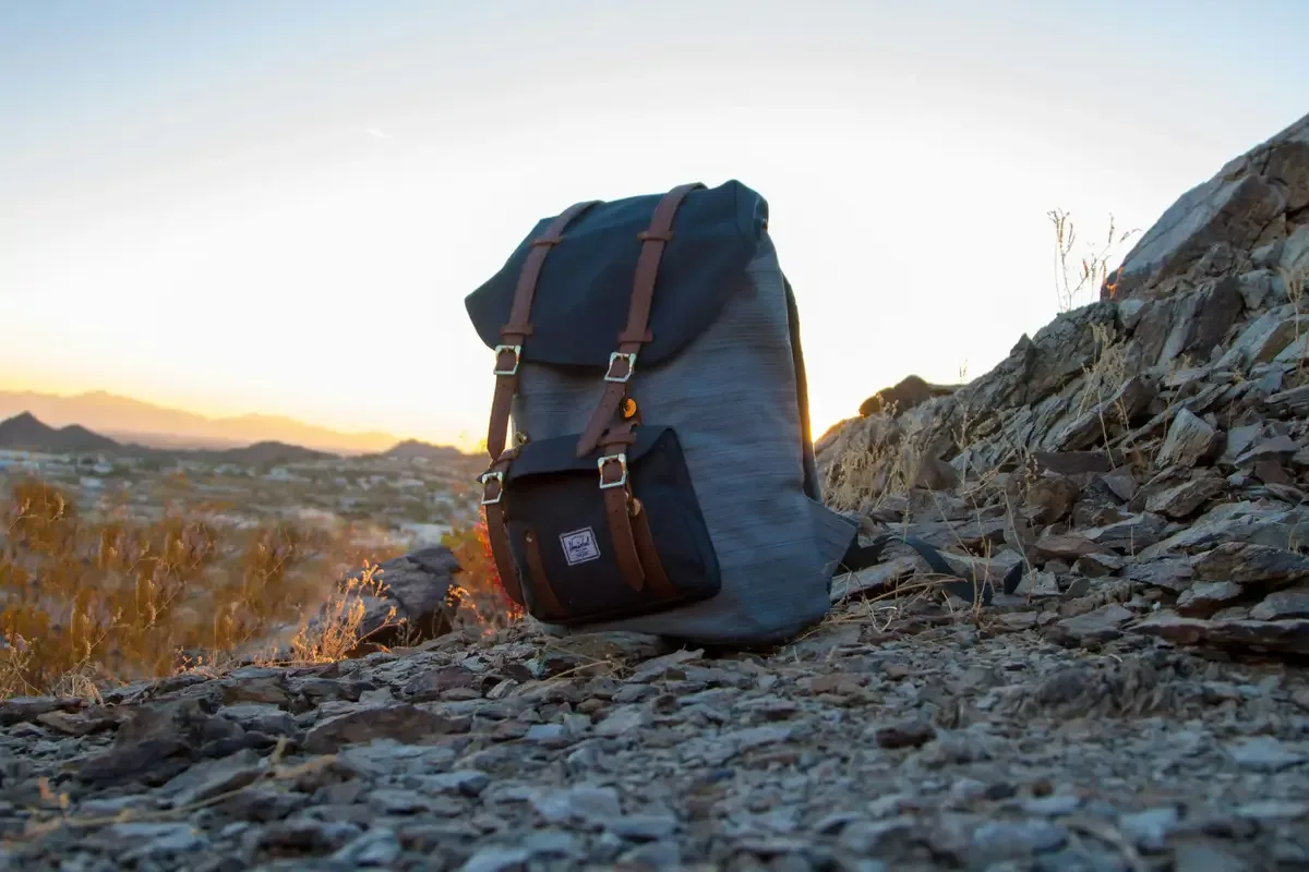 backpack and stones