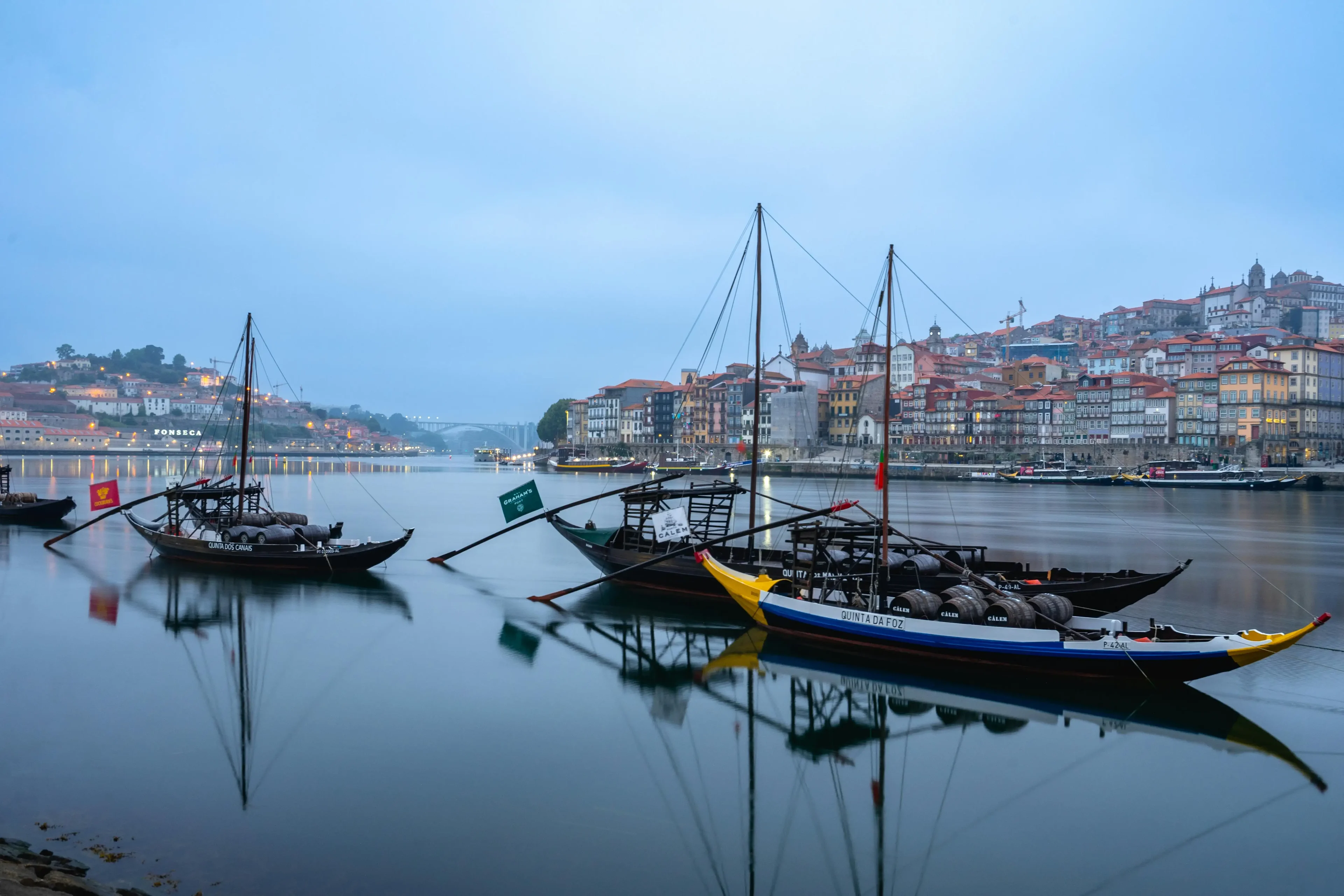 Boats on the lake in Portugal and the cityscape
