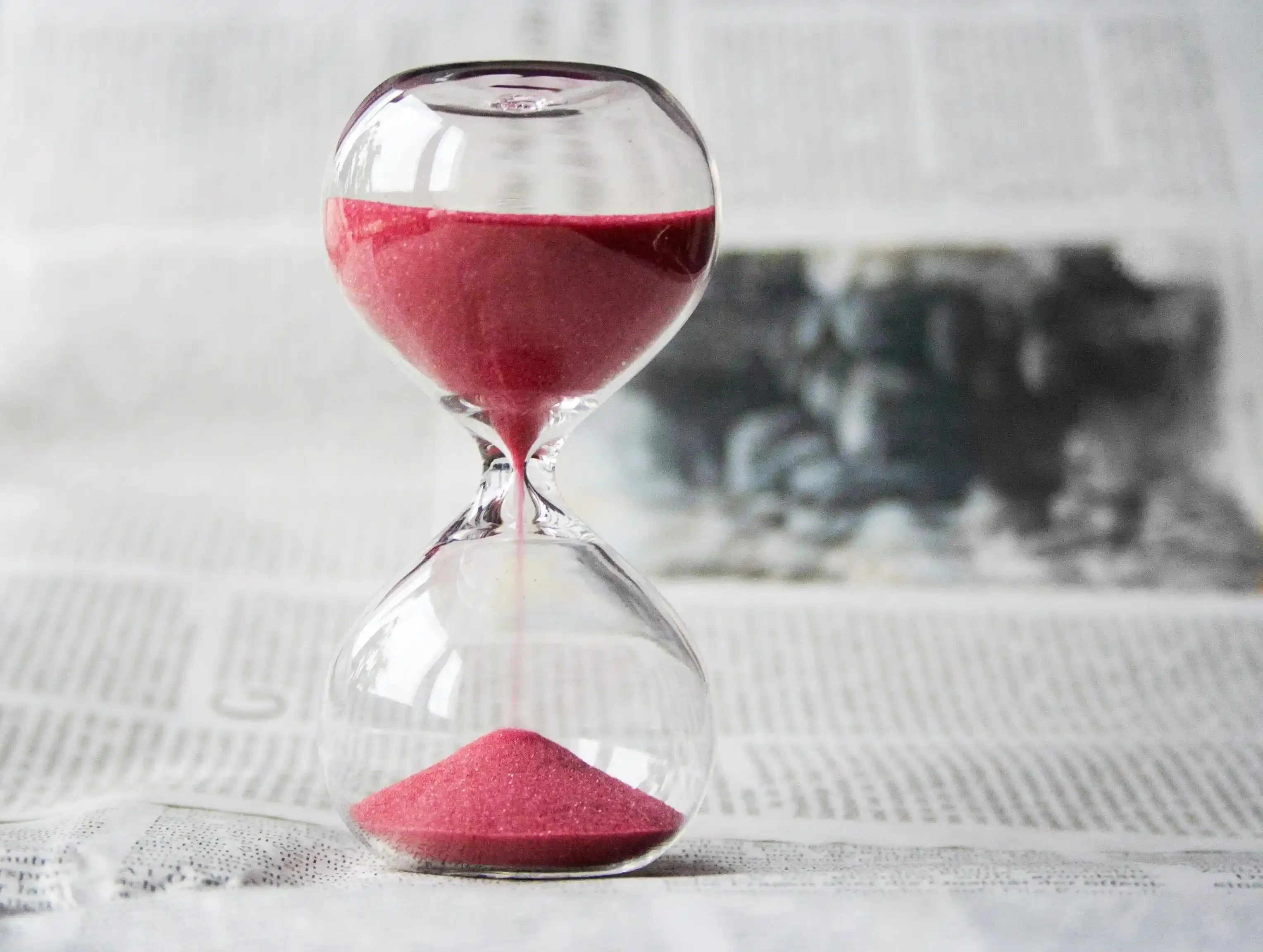 red colored hourglass