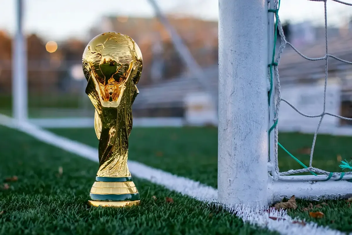 World Cup trophy on a football pitch