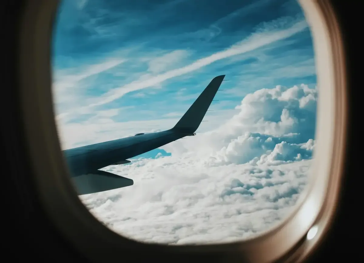 plane window and the sky