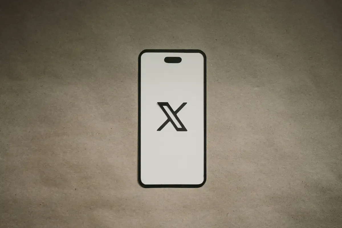 X app icon on smartphone screen