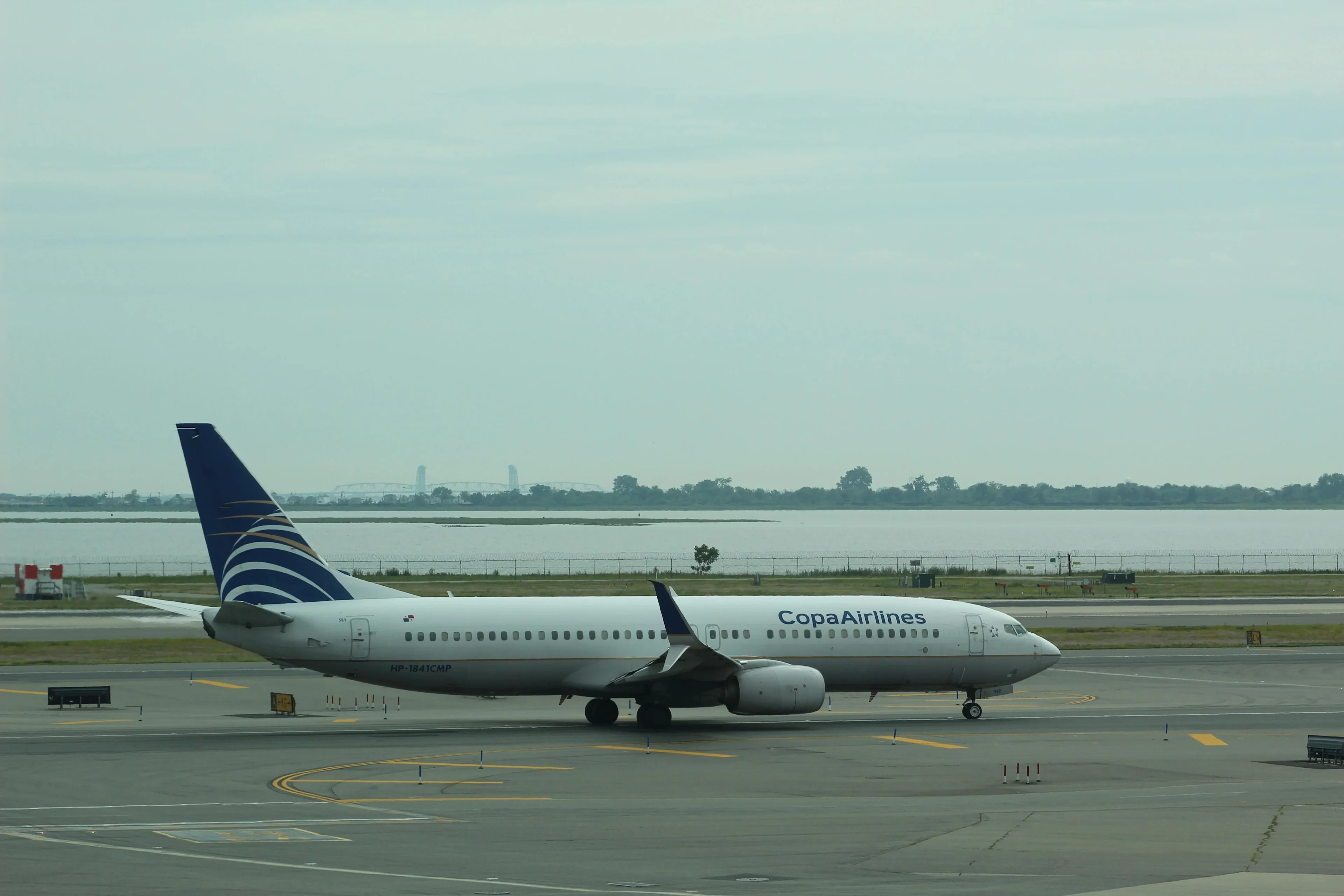 The white plane located in the airport terminal