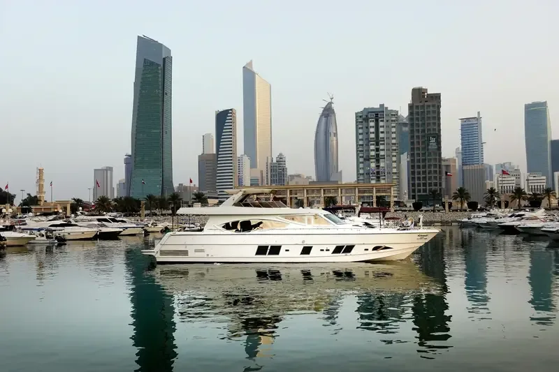 a boat and skyscrapers