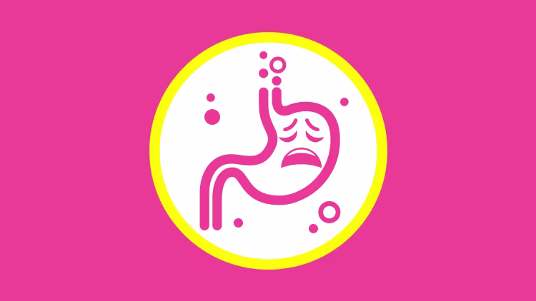 Person in pink athletic wear forming a heart shape with hands over their bare stomach, symbolizing gut or digestive health.