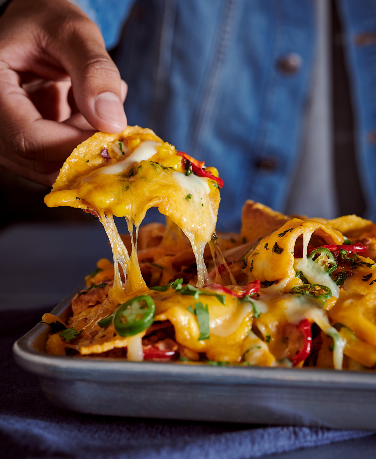https://images.ctfassets.net/j8tkpy1gjhi5/2euUkMoiVBkyBhmmxsiJIT/f30839e59f55e1d5f980ce1c4b3932d0/spicy-loaded-nachos-hero.jpg?w=1200