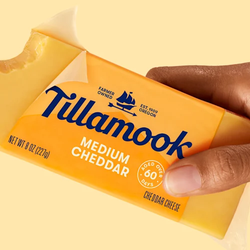 Tillamook cheddar cheese block zoomed in