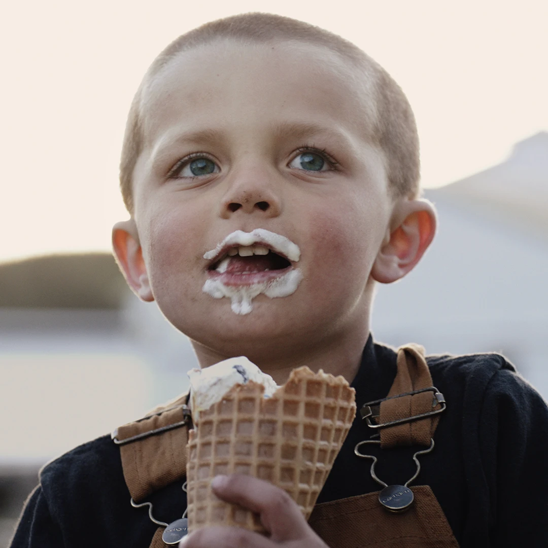 Child holding Tillamook Ice Cream