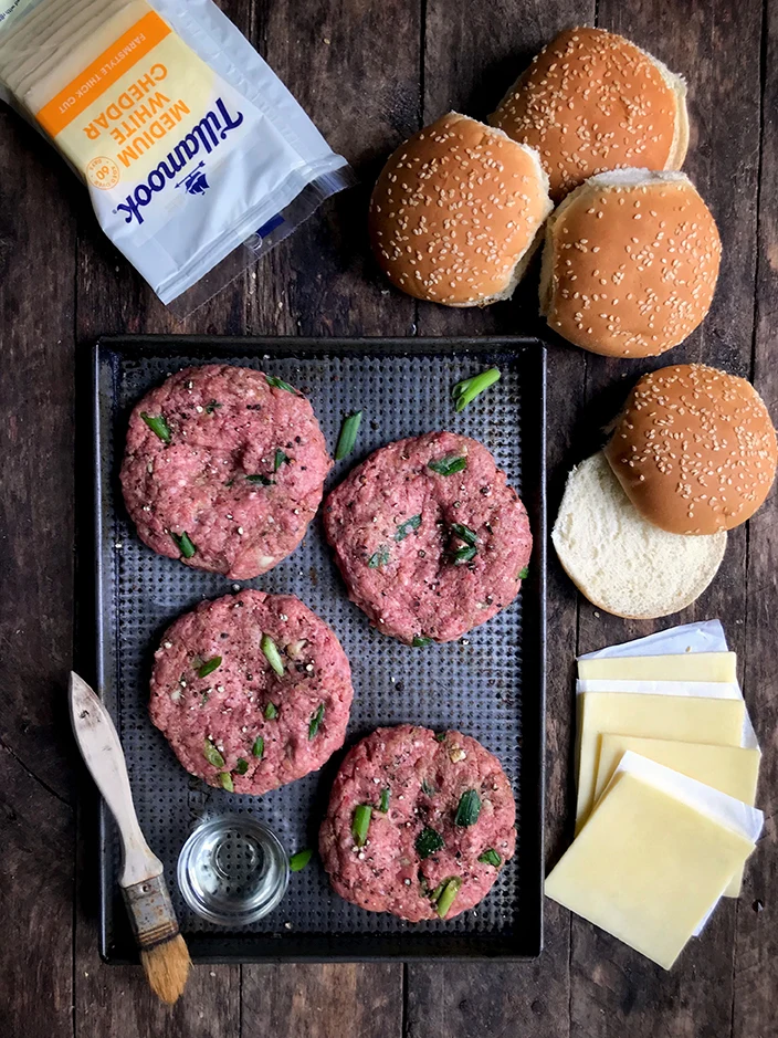 Burger patties with Tillamook Cheese Slices