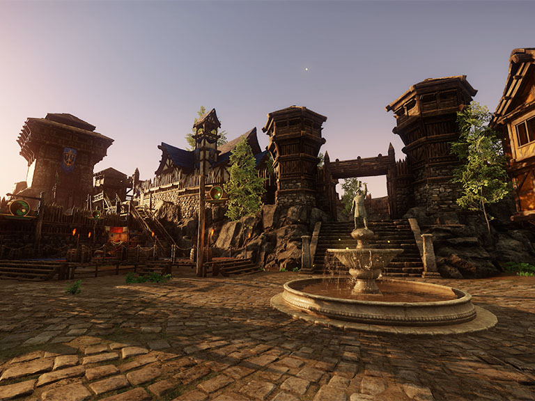 A screenshot showing the newly rearranged town square for Monarch's Bluffs, featuring several tall towers, an open courtyard, and a decorative fountain.