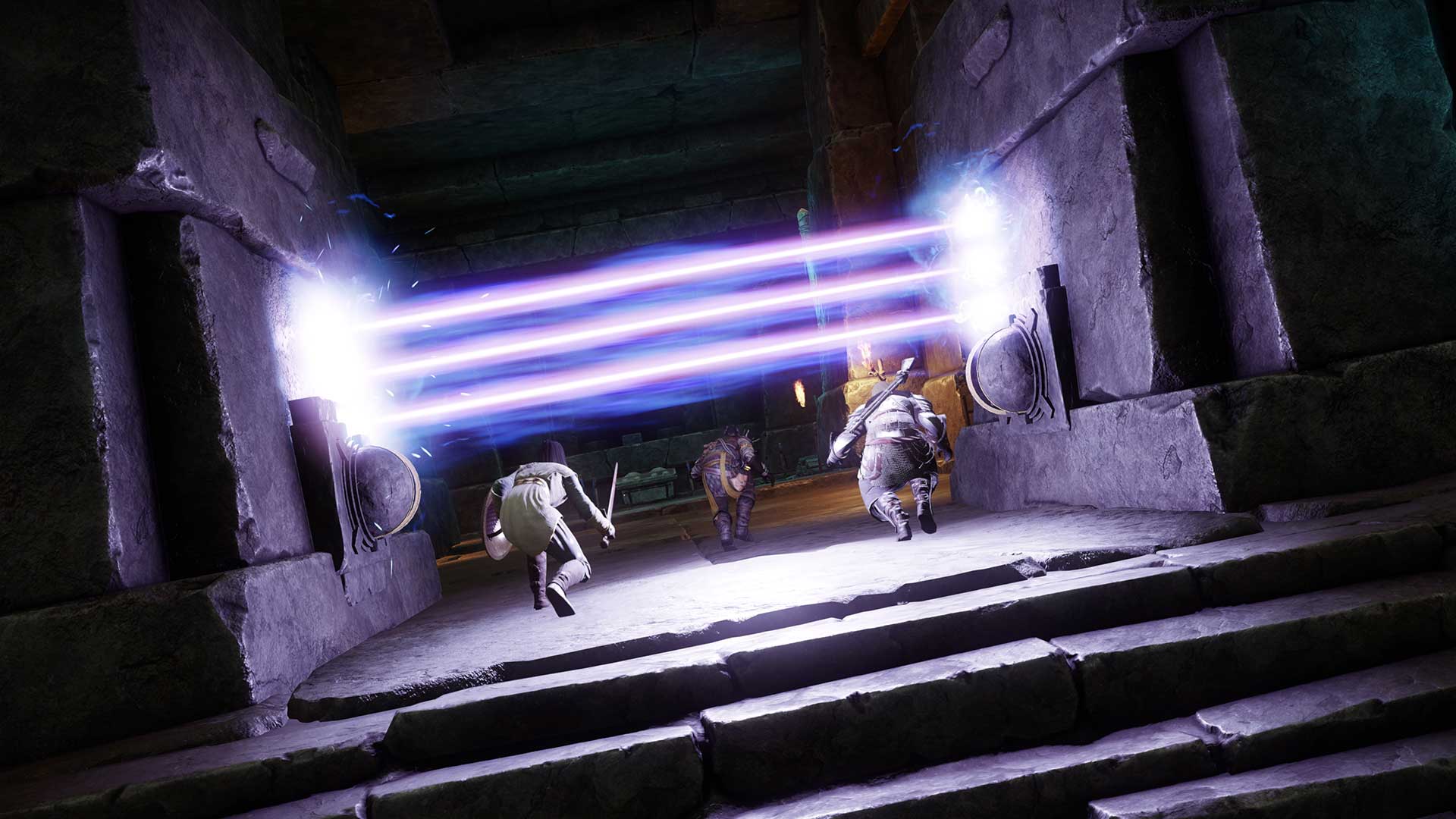 Three adventurers crouch down to pass under a barrier of three bright purple beams of light in an otherwise darkened hallway. 