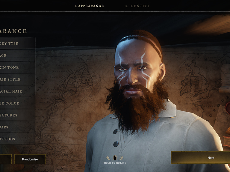Une capture d'écran de l’interface de personnalisation de personnage. On aperçoit un personnage à la peau foncée, avec une barbe touffue et des tatouages bleus formant des pointes.