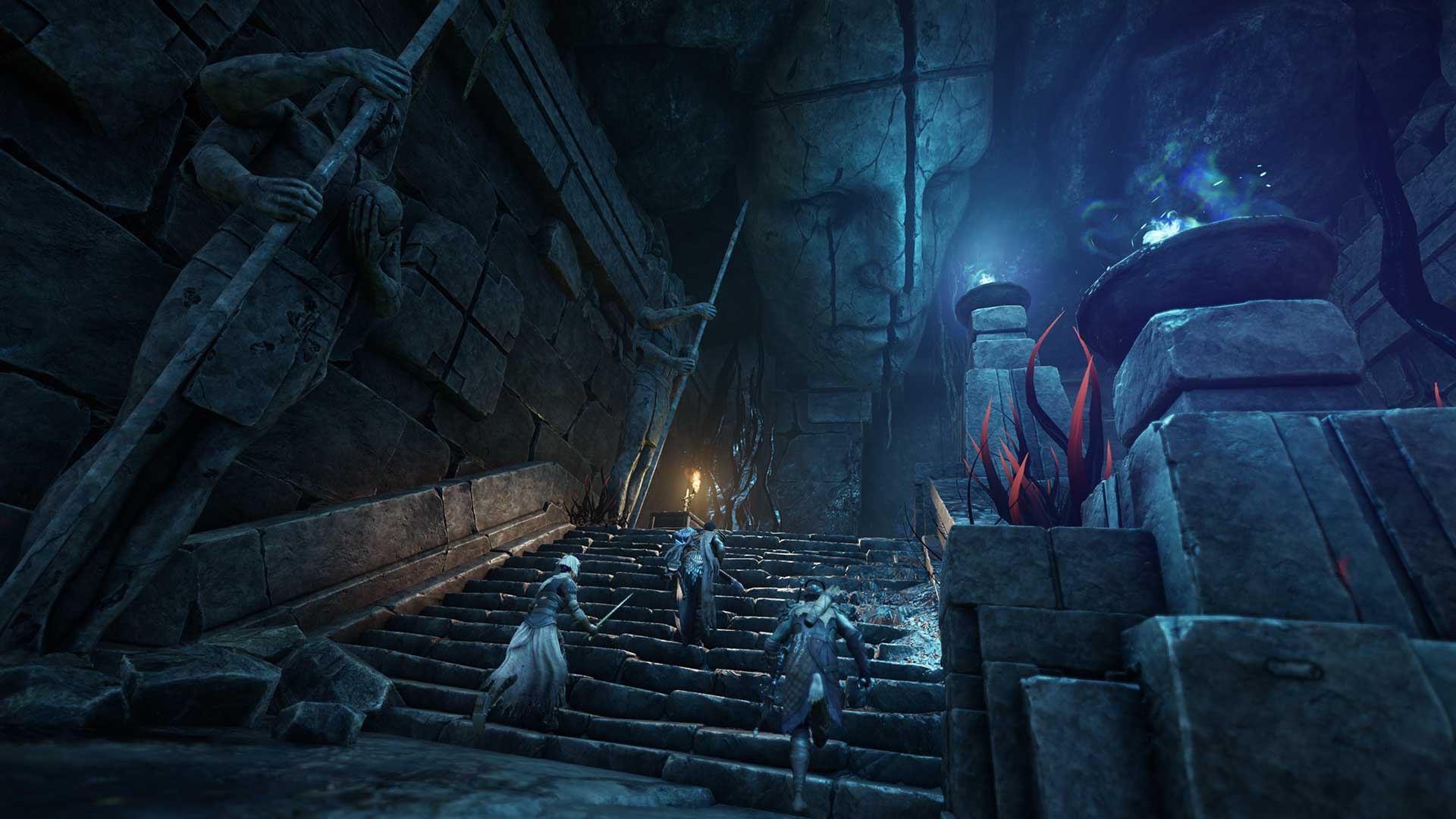 A group of adventurers with their weapons draw race up a flight of ancient stone stairs. The stairway is dimly lit with blue and orange flame sconces.