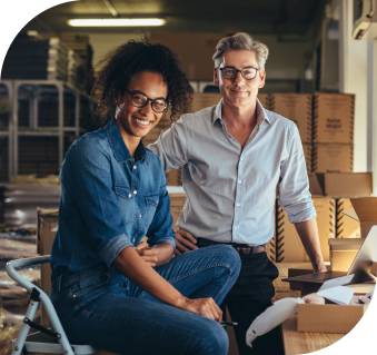 Image of two professional smiling toward the screen
