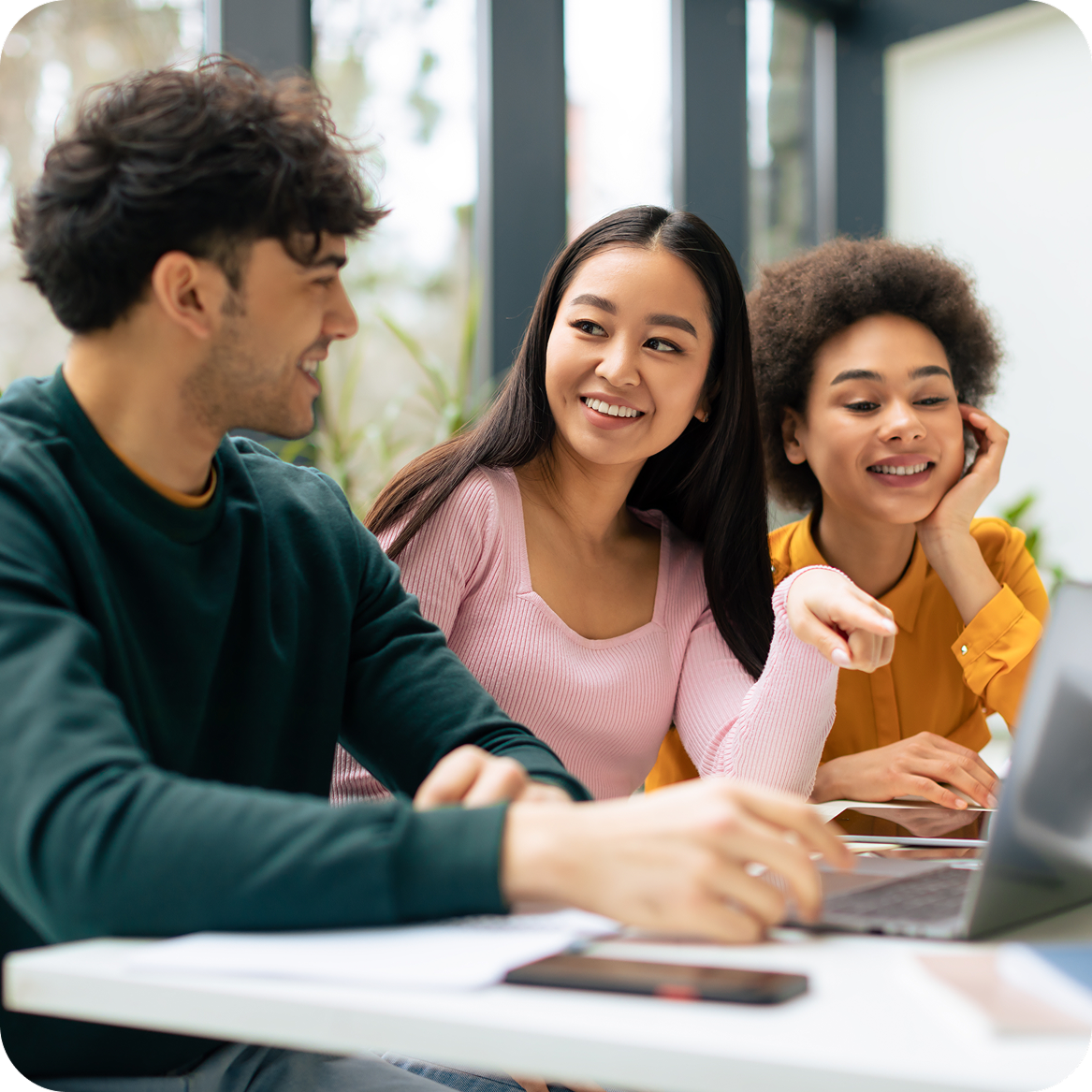 Young group working on laptop