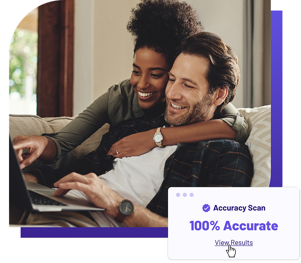 Couple on couch with laptop