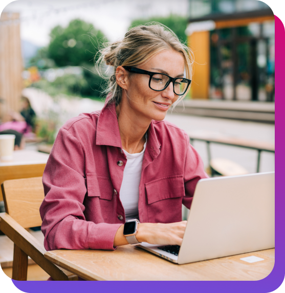girl working on laptop smiling