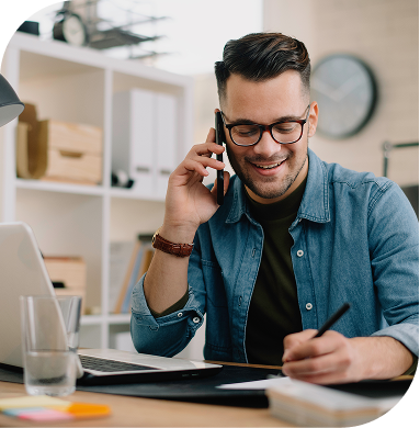 Man on the phone with laptop