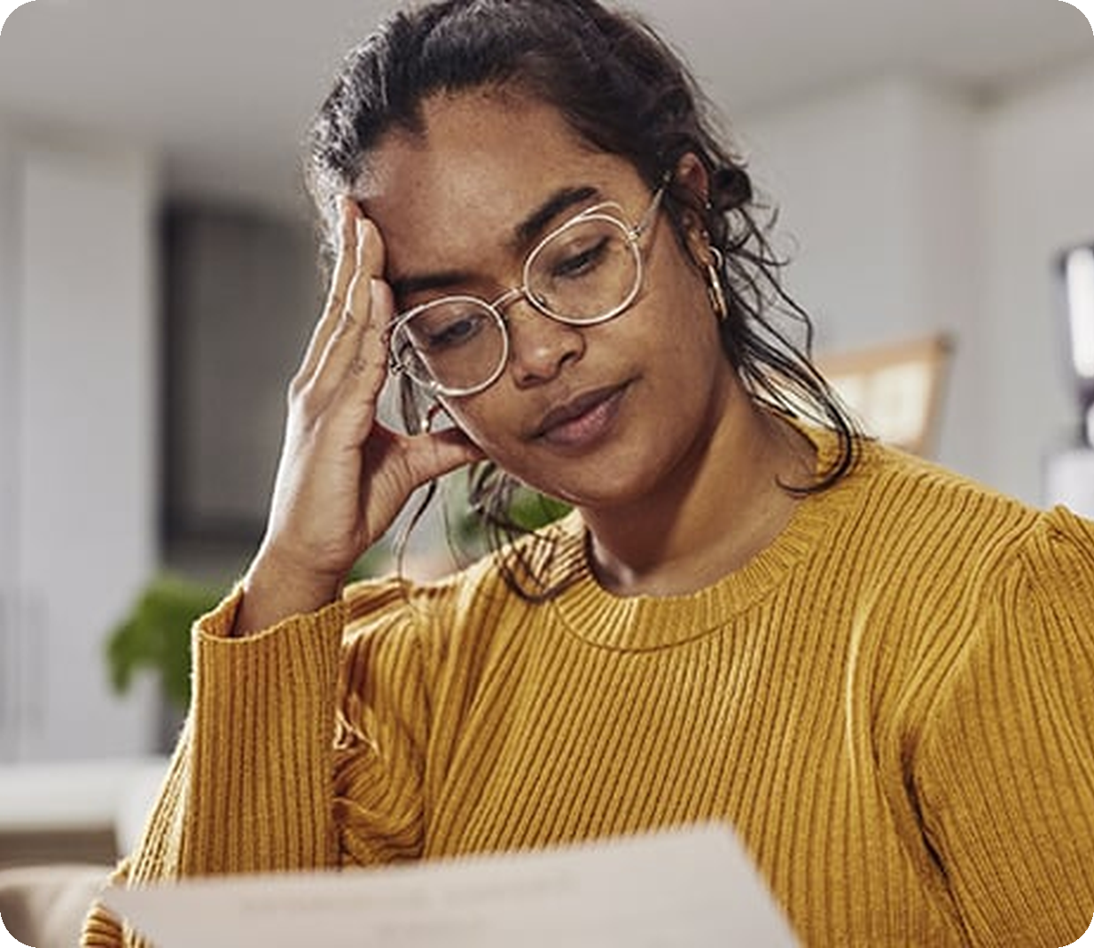 Woman looking at her tax extension documents.