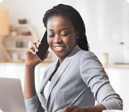 Let a tax expert do your taxes from start to file a lady Infront of her laptop smiling