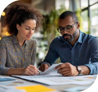 man and woman working on some paperwork